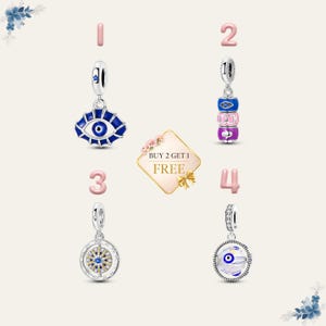 May include: Four silver charm pendants with colorful designs. One pendant features a blue eye design, another has stacked blue, pink, and purple beads, a third has a compass design, and the last has a blue eye design. A sign reads "BUY 2 GET 1 FREE".