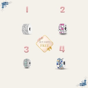 May include: A selection of silver charm beads with diverse designs, such as chain links, floral patterns, and gemstones. A promotional sign reads "BUY 2 GET 1 FREE". The beads are numbered 1 to 4 in pink.