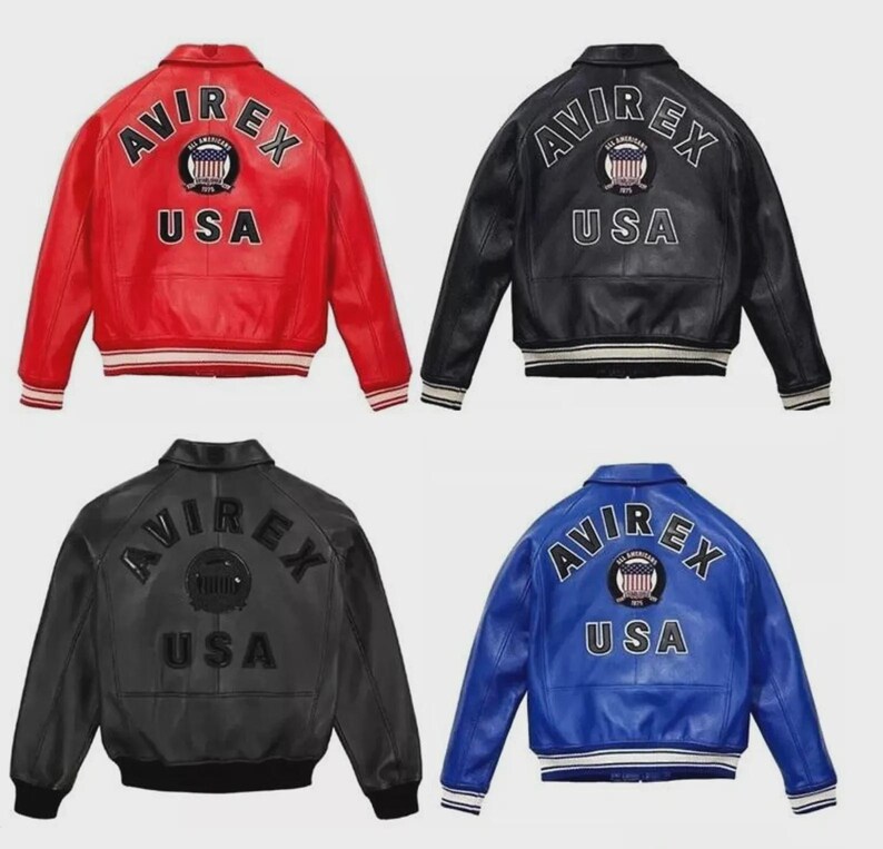 May include: Four leather bomber jackets in red, black, and blue. Each jacket features the "AVIREX" logo and "USA" text on the back, with a striped hem and cuffs. The jackets are a classic style.