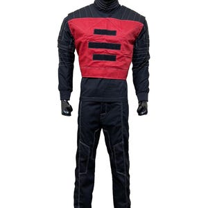 May include: A black and red outfit with white stitching. The outfit includes a black turtleneck, long-sleeved shirt, and pants. A red vest with three black horizontal stripes is worn over the shirt. The pants have white stitching.