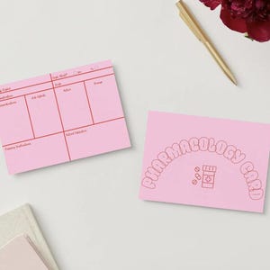 May include: Two pink sticky notes. One has a grid with red lines and text fields for medical information. The other note says "Pharmacology Card" in a curved design with a pill bottle and pills graphic.