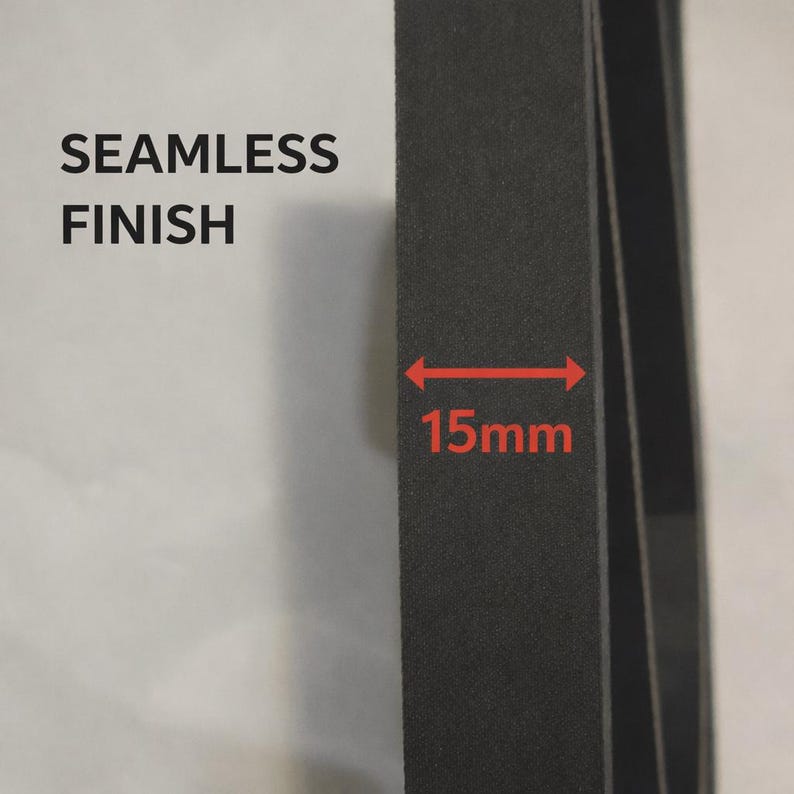 May include: A black, flat, rectangular strip with a matte texture. The text SEAMLESS FINISH is printed in black on the left. A red horizontal arrow indicates a width of 15mm across the black strip, highlighting its specific measurement.