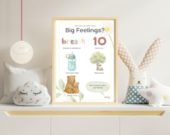 May include: A framed print with the text "Big Feelings?" and illustrations of coping strategies. The print includes a watercolor style image of a bear hugging a cub, a water bottle, and a tree. A decorative bunny and cloud pillow are also visible.