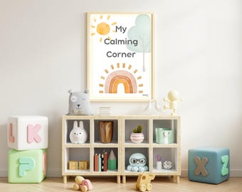 May include: A framed print with the text "My Calming Corner" above a watercolor rainbow and sun. The print hangs above a wooden shelf filled with decorative items, including a bear pillow, a bunny figurine, and alphabet blocks.