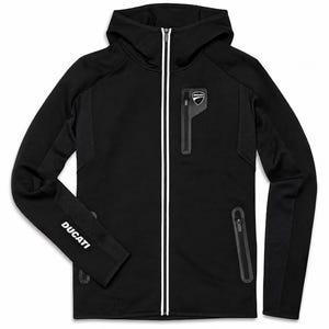 May include: A black hooded jacket featuring a full-length front zipper with white trim, two side pockets with black zippers, and a chest pocket with a black zipper. The Ducati logo is on the chest and the word Ducati is printed on the sleeve.