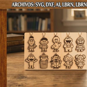 May include: A light-colored wooden display board featuring ten laser-engraved character ornaments hanging from small chains. The characters include various iconic figures from a children's television show. Text at the top reads: ARCHIVOS: SVG, DXF, AI, LBRN, LBRN2, PDF.