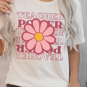 May include: A set of three ceramic mugs with a speckled, matte finish. The mugs are in shades of cream, light gray, and dark gray. Each mug has a simple, minimalist design, perfect for coffee or tea.