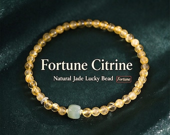 Puede incluir: Una pulsera con cuentas de citrino amarillo translúcido, una cuenta de jade verde pálido lisa y una pequeña cuenta espaciadora plateada. El texto Fortune Citrine, Natural Jade Lucky Bead, Fortune y Citrine beads, jade accent: a vibrant statement for your wrist es visible.