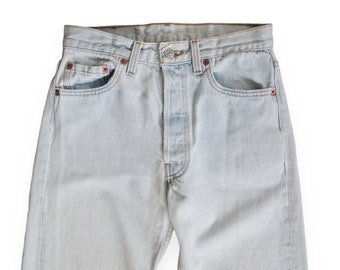 vintage Levis 501 / distressed jeans / 1990s Levis 501 faded light wash denim straight leg high waist jeans 27