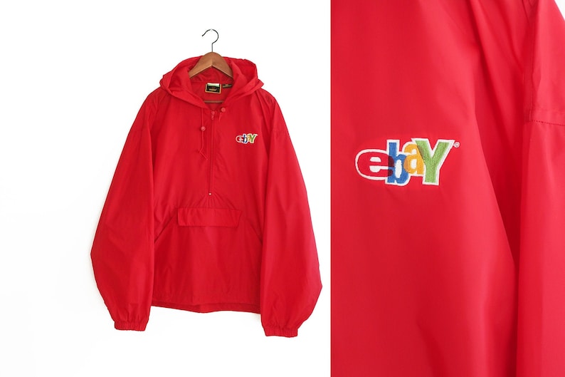 May include: A red hooded windbreaker jacket with a large multi-coloured "ebay" logo on the front.
