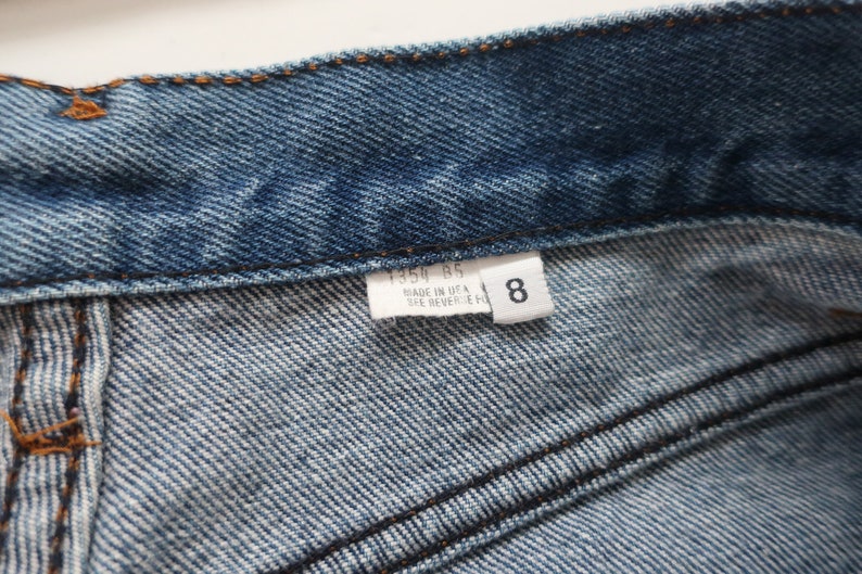 vintage Levis 501 / high waist jeans / 1980s Levis 501 raw hem dark wash high waist jeans 26 image 5
