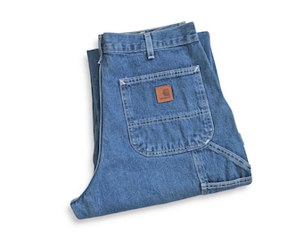vintage Carhartt work pants / 90s Carhartt baggy carpenter jeans work wear pants 32