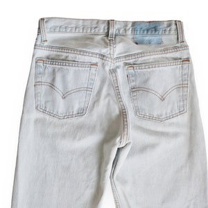 vintage Levis 501 / distressed jeans / 1990s Levis 501 faded light wash denim straight leg high waist jeans 27 image 4