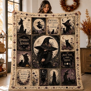 May include: A rectangular throw blanket featuring a patchwork design with illustrations of witches, black cats, moons, and floral motifs. Text includes "Witches don't compete we conjure," "Spooky Season," "Make your own magic," and "Well behaved women rarely make history."