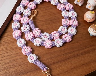 Correa de macramé hecha a mano con margaritas para el teléfono, bandolera, correa con dije floral estilo boho, correa larga de algodón para el teléfono para mujer.
