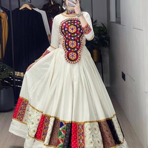 kutch work designs for dresses Kutchwork embroidery panel neck design