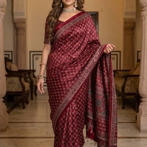 Ajrakh Print Satin Silk Saree with Real Mirror Work and Fancy Pearl Moti Tassels