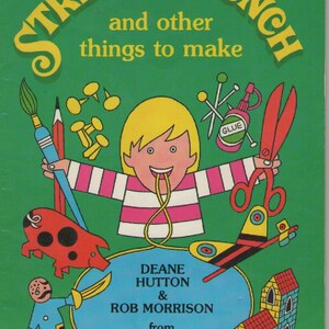 May include: A book cover featuring a colourful illustration of a child making a string figure. The title of the book is "String for Lunch and other things to make" and it's from TV's "Curiosity Show".