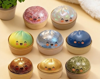 Juguete blando con forma de dumpling brillante y colorido para niños y adultos para aliviar el estrés.