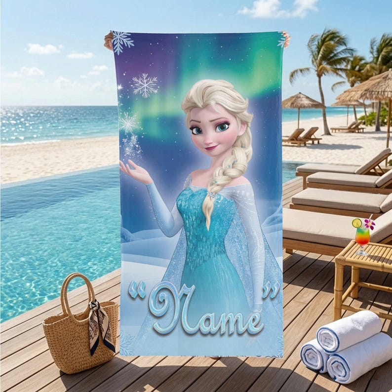May include: A blue beach towel featuring a cartoon image of a princess in a blue dress, with a snowy background and the text "Name". The towel has a blue and purple sky background with snowflakes.