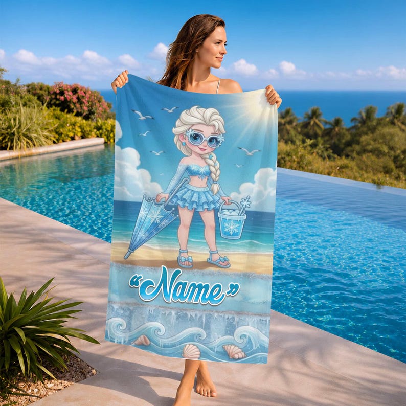 May include: A light blue beach towel featuring a cartoon illustration of a girl in a blue outfit, sunglasses, and a braided hairstyle, holding an umbrella and a bucket. The towel has the word "Name" in a script font, with a beach and ocean scene.