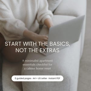 Può includere: Una persona usa un laptop su un divano colorato chiaro. L'immagine include il testo "START WITH THE BASICS, NOT THE EXTRAS" e "A minimalist apartment essentials checklist for a calmer home reset."