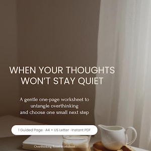 May include: A digital worksheet titled "When Your Thoughts Won't Stay Quiet" with text describing a one-page guide to untangle overthinking. The image includes a glass of coffee, a small creamer, and a wooden tray with biscotti.