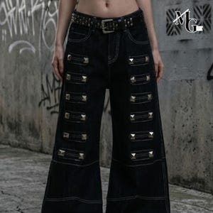 Studded Baggy Jeans | Dark Straight Leg Pants | Daily Wear | Punk Streetwear Style

Black studded wide leg jeans with rivet detail streetwear style