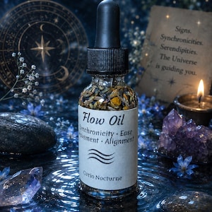 May include: A clear glass dropper bottle filled with dried herbs and oil, featuring a white label with the text Flow Oil, Synchronicity, Ease, Movement, Alignment, and Curio Nocturne, topped with a black dropper cap and filled with botanical bits.
