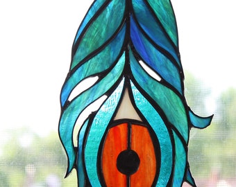 Stained-glass suncatcher of a peacock feather