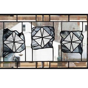 Modern geometric stained glass panel with beveled glass