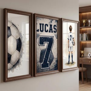 May include: A set of three framed wall art prints featuring a football theme. The first print shows a black and white football. The second print displays the name LUCAS and the number 7. The third print depicts a football player wearing a jersey.