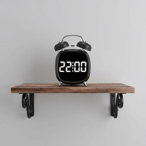 Reloj despertador digital con control por voz, pantalla LED, modo nocturno, función de repetición, control por temperatura, ideal para personas con sueño profundo y diseño moderno.