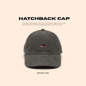 May include: A dark green corduroy baseball cap with the text "HATCHBACK CAP" in bold black letters. The cap has a small embroidered red car design. The text "REDLINE © 2026" is at the bottom.