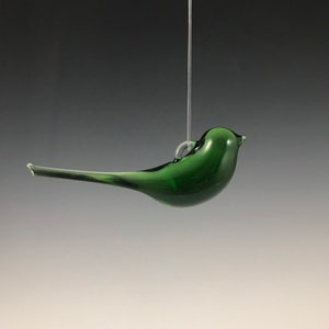 Translucent green glass bird ornament