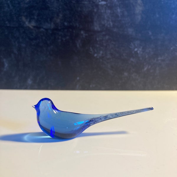 Tiny glass blue bird