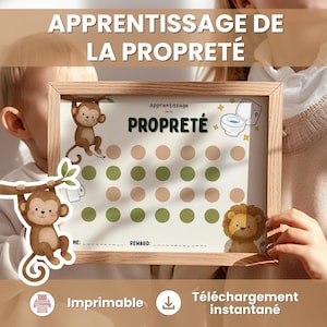 May include: A wooden-framed chart with the text "APPRENTISSAGE DE LA PROPRETÉ" and "PROPRETÉ". The chart features illustrations of a monkey, a lion, and a toilet. It includes spaces for rewards and a printable download icon.