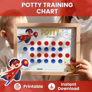 May include: A framed potty training chart with a superhero theme. The chart features red and blue circles for tracking progress, with illustrations of a toilet, a roll of toilet paper, and superhero characters. Text includes "Potty Training" and "Reward:"