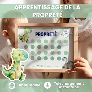 Può includere: Un grafico con cornice in legno con il testo "APPRENTISSAGE DE LA PROPRETÉ" e "PROPRETÉ". Il grafico presenta una serie di cerchi verdi, illustrazioni di dinosauri e una grafica del water. Sono presenti anche le parole "Imprimable" e "Téléchargement instantané".