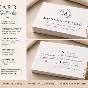 May include: A stack of white business cards featuring the text Modern Studio, Hair, Beauty, Wellness, and a logo with the letter M. The reverse side displays contact information, including a phone number, social handle, email, and address.