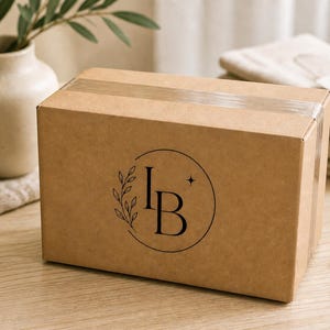 custom vinyl logo decal showing clean cut edges and high-quality business branding sticker on box