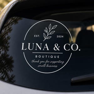 Business vinyl decal with custom logo display on car for small business branding