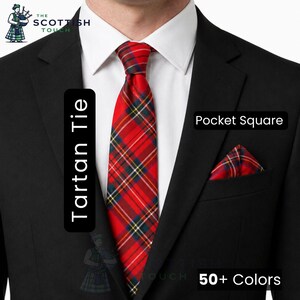 May include: A black suit with a white dress shirt, red tartan tie, and matching pocket square. The tie and pocket square feature a red, green, blue, and yellow plaid pattern. Text on the image reads "Tartan Tie" and "Pocket Square".