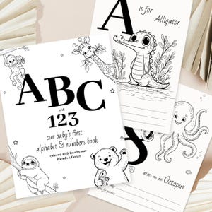May include: A collection of black and white coloring books for babies and toddlers. The books feature the alphabet, numbers, and animal illustrations. The cover of one book reads "ABC and 123 our baby's first alphabet & numbers book."