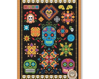 May include: A framed, black background cross-stitch pattern featuring colorful sugar skull designs. The skulls are in various colors, including blue, green, and purple, with intricate floral and geometric patterns. The frame is a light brown color.