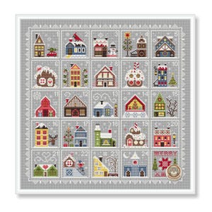 May include: A cross-stitch pattern depicting a Christmas advent calendar with 24 numbered houses in various colours. Each house has unique details like snow, trees, and festive decorations. The design is framed with a grey border.