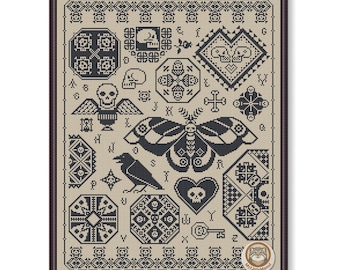 May include: Framed cross-stitch sampler in black and beige. The design features a moth, raven, skulls, hearts, and geometric shapes. The sampler has a border of repeating bear figures and decorative patterns. The overall theme is gothic and macabre.