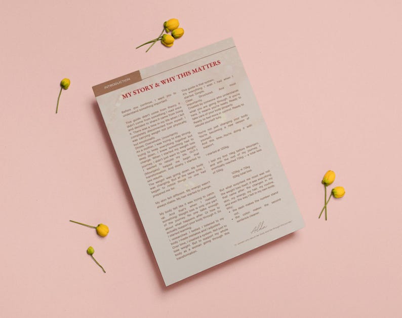 May include: A printed document with the title "MY STORY & WHY THIS MATTERS" on a pink background, with yellow flowers scattered around. The document has text and a brown header. The overall theme is self-help or wellness.