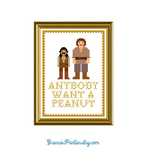 Puede incluir: Un punto de cruz enmarcado con dos figuras pixeladas y el texto "ANYBODY WANT A PEANUT" en dorado. Las figuras son en tonos marrones y beige, con un marco dorado. El nombre de la tienda Etsy está en la parte inferior.