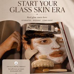 May include: An open magazine with the text "START YOUR GLASS SKIN ERA" and beauty products. A face mask is applied to a person's face. Products include a hair clip, brush, and skincare tube. A digital product download is offered.